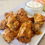 Picture of Buffalo Chicken Wings with homemade ranch and vegetables