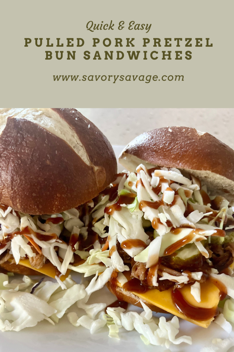 Picture of Pulled Pork Sandwiches on pretzel buns with cabbage, cheese, pickles and Kinder's BBQ Sauce