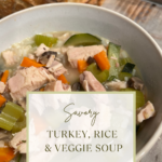 Warm bowl of Savory Turkey Rice & Veggie Soup made with homemade turkey bone broth, rice, and fresh vegetables.