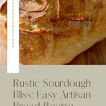 Golden homemade sourdough bread with a crispy crust and soft, airy interior, freshly sliced on a wooden cutting board